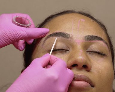 Customer receiving facial treatment